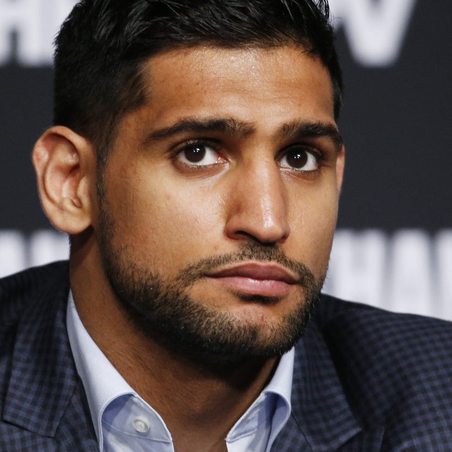 Amir Khan attends a news conference at the MGM Grand, Wednesday, May 4, 2016, in Las Vegas. Khan is scheduled to fight Canelo Alvarez in a middleweight title bout Saturday in Las Vegas. (AP Photo/John Locher)