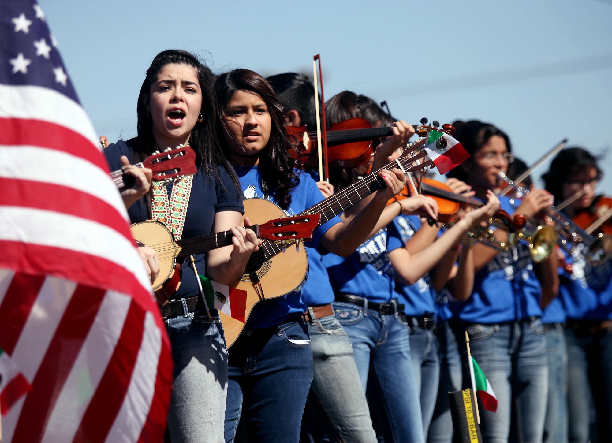Members of the Ector Junior High Mariachi Band perform while riding on a float Saturday, May 3, 2014 during the Cinco de Mayo parade on Crane Avenue in Odessa, Texas. Cinco de Mayo marks the Battle of Puebla on May 5, 1862, when Mexican troops defeated a French army of Napoleon III, then considered the mightiest military in the world. It is considered a bigger holiday in the U.S., celebrating Mexican heritage in many cities. (AP Photo/Odessa American, Edyta Blaszczyk)