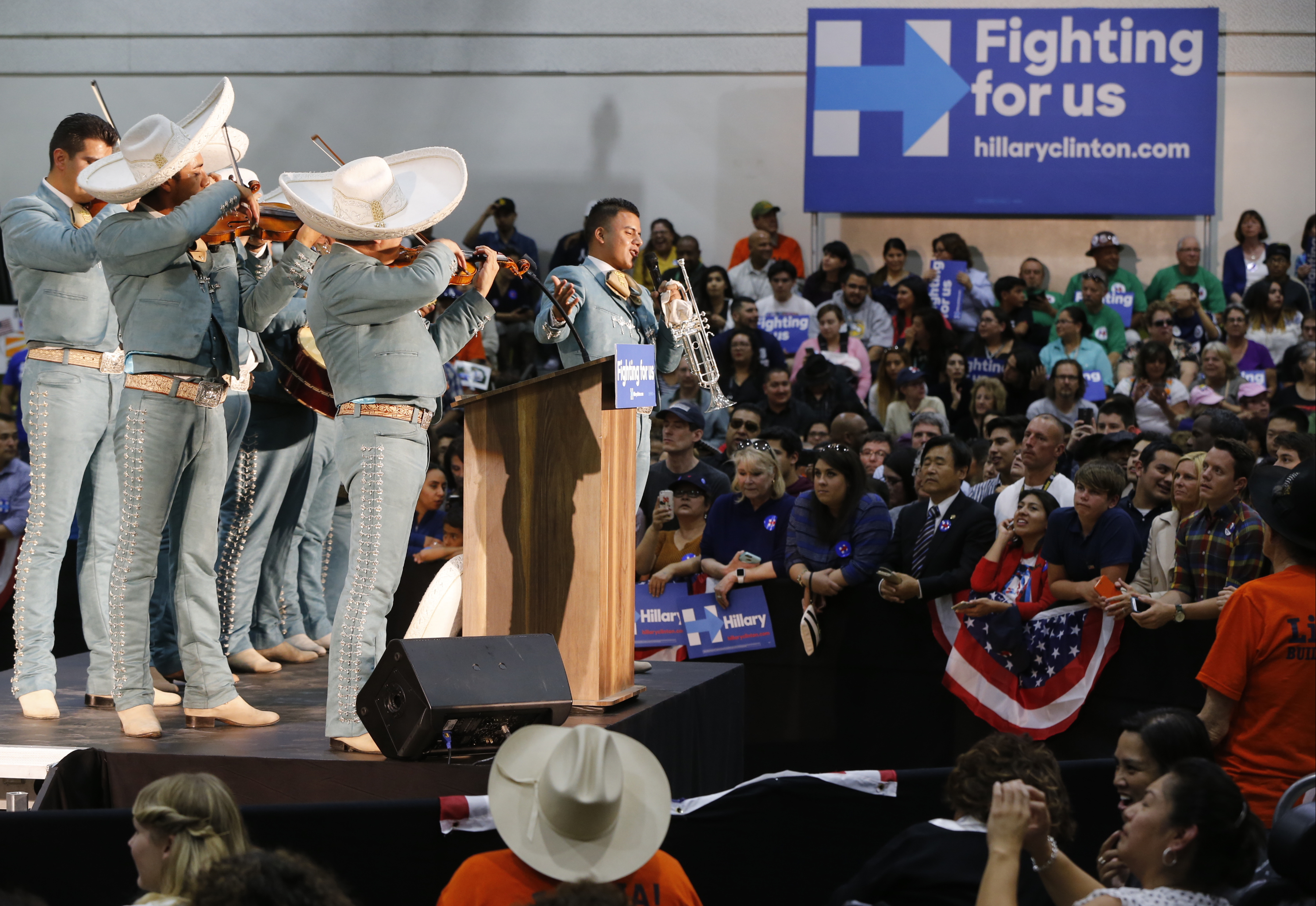 A mariachi band performs at an event of Democratic presidential candidate Hillary Clinton campaign at East Los Angeles College in Los Angeles, Thursday, May 5, 2016. (AP Photo/Damian Dovarganes)