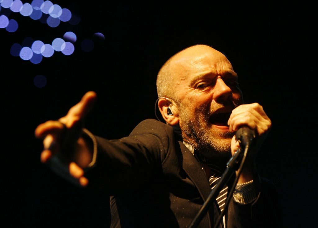 Michael Stipe, frontman of US rock band R.E.M., performs on stage at the Hallenstadion in Zurich, Switzerland, Wednesday, Sept. 24, 2008. (AP Photo/Keystone/Steffen Schmidt)