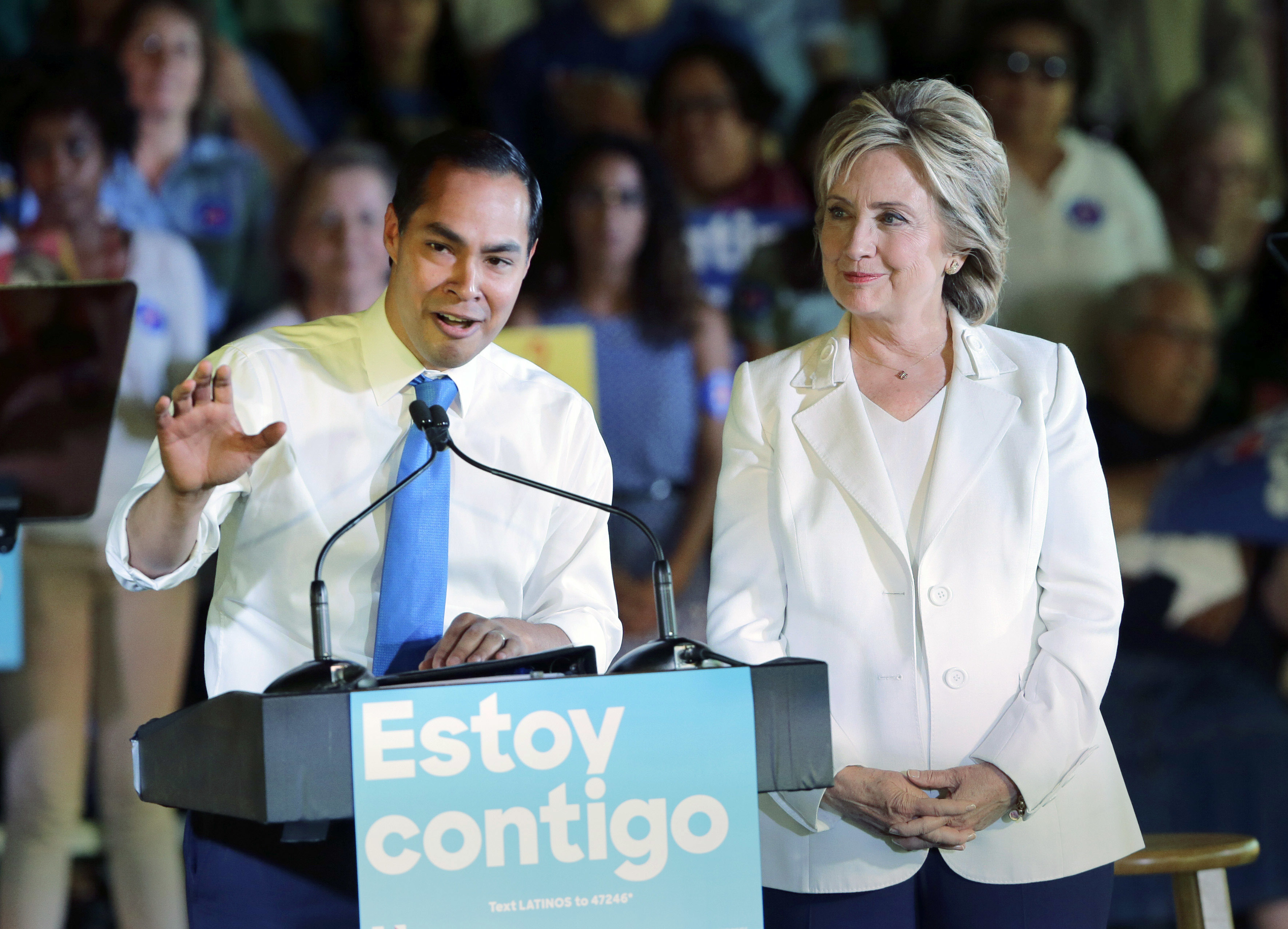 FILE - In this Oct. 15, 2015 file photo, Housing and Urban Development Secretary Julian Castro, left, speaks during a campaign event for Democratic presidential candidate Hillary Rodham Clinton, right, in San Antonio. Castro is returning home Friday, June 17, 2016, swarmed by the same speculation about whether he could be Hillary Clinton's running mate this fall. (AP Photo/Eric Gay, File)