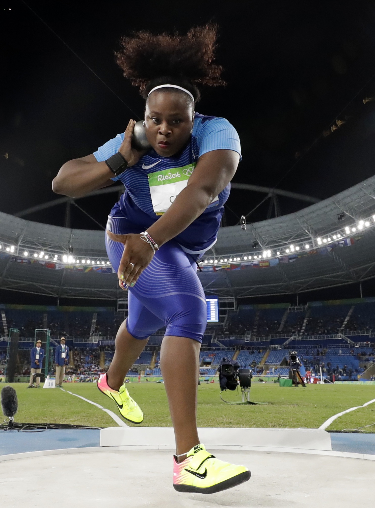 United States' Michelle Carter competes in the final of the women's shot put during the athletics competitions of the 2016 Summer Olympics at the Olympic stadium in Rio de Janeiro, Brazil, Friday, Aug. 12, 2016. (AP Photo/Matt Dunham)
