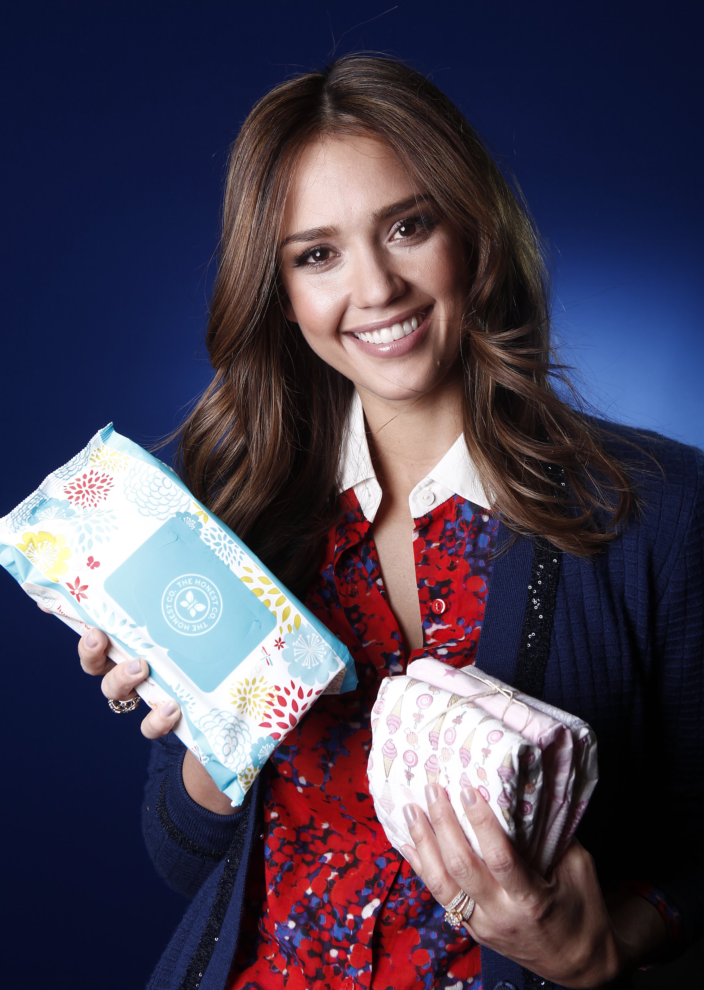 Actress Jessica Alba poses for a portrait Tuesday, Jan. 17, 2012, in New York to promote Honest.com, a new e-commerce eco friendly and non-toxic baby product company. (AP Photo/Carlo Allegri)