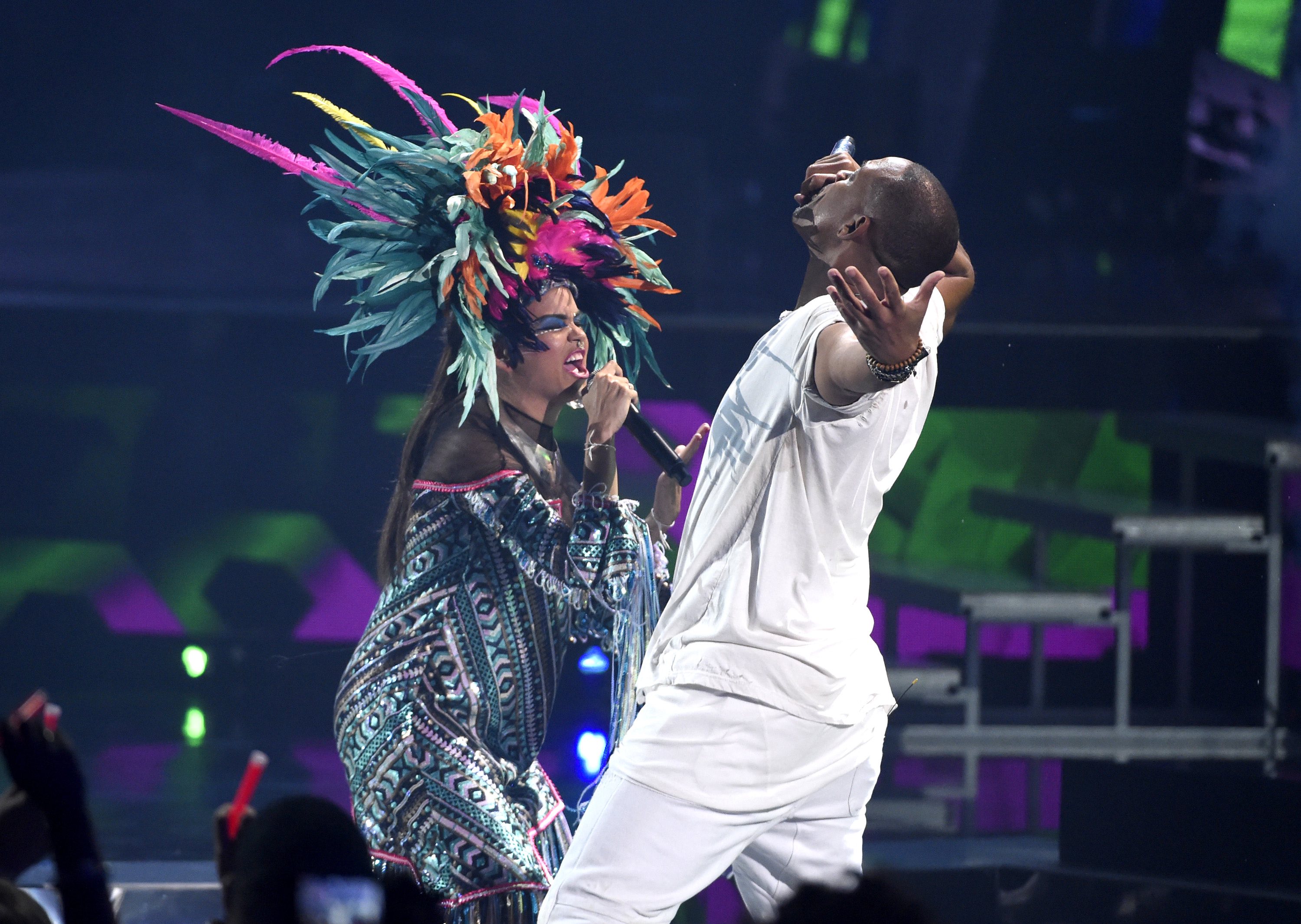 Liliana Saumet, of Bomba Estereo, and Will Smith perform "Fiesta" at the 16th annual Latin Grammy Awards at the MGM Grand Garden Arena on Thursday, Nov. 19, 2015, in Las Vegas. (Photo by Chris Pizzello/Invision/AP)