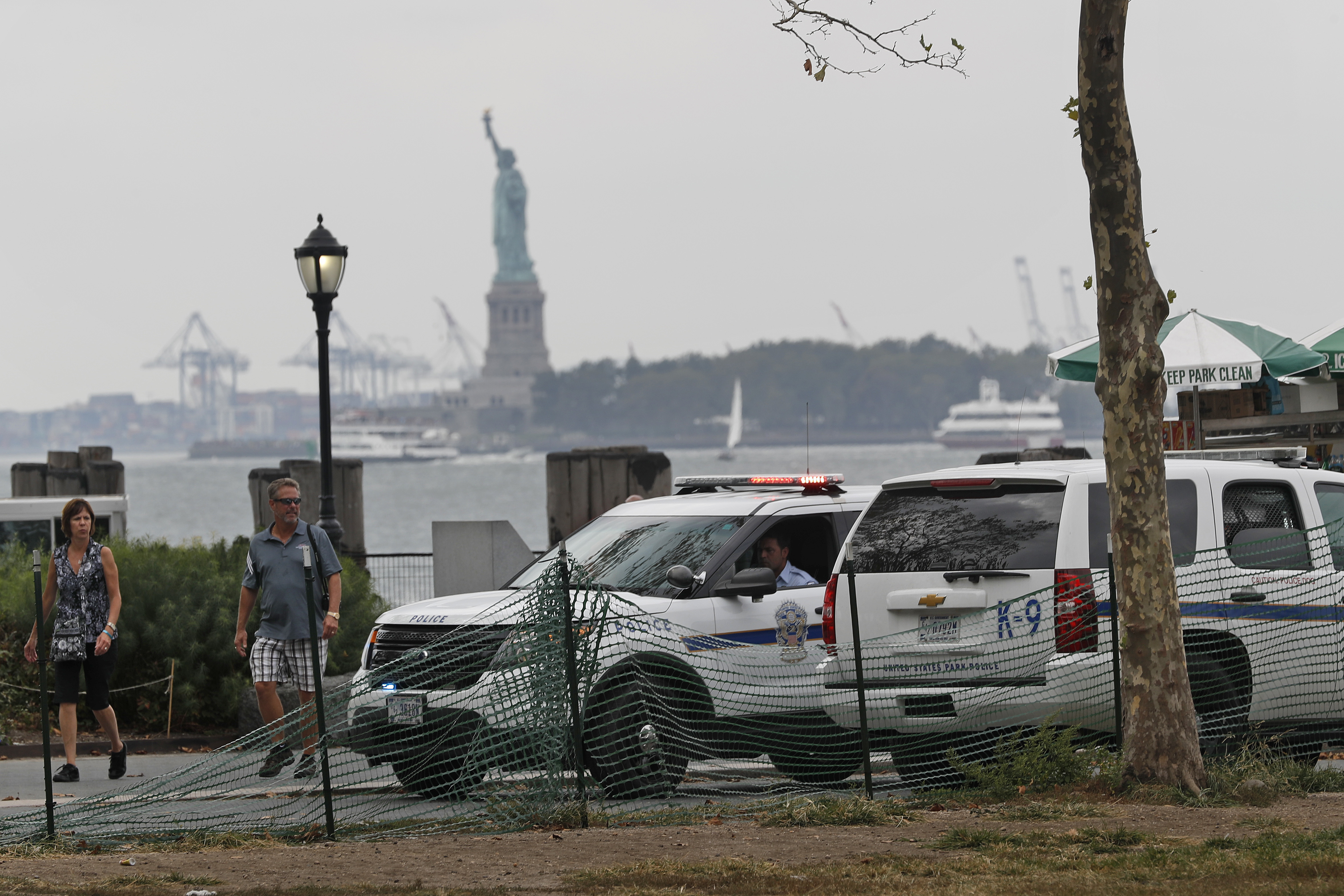 United States Parks Dept. police patrol Battery Park near the ferry entrance to the Statue of Liberty, Sunday, Sept. 18, 2016, in New York. Gov. Cuomo said 1,000 additional law enforcement officers were being deployed after the Saturday night blast in Chelsea, a primarily residential neighborhood on Manhattan's west side that's known for its art galleries and large gay population. He encouraged New Yorkers to go about their day as usual.(AP Photo/Mary Altaffer)